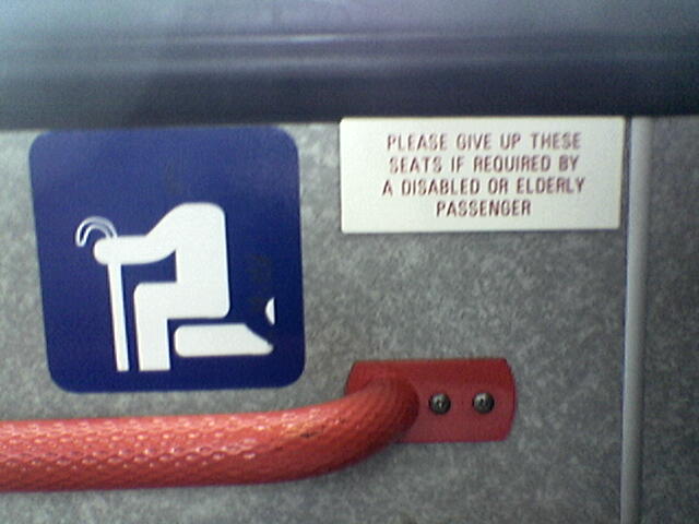 Bus sign depicting a disabled (or rather headless) passenger